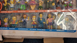 Simpsons 25 piece collector sets- 1-3. Figurines in very good condition. Box very damaged.