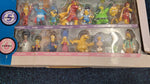 Simpsons 25 piece collectors set 4-6. Figurines in very good condition . Box damaged