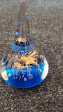 Teardrop glass ring holder/ paperweight - Blue with gold design - unbranded