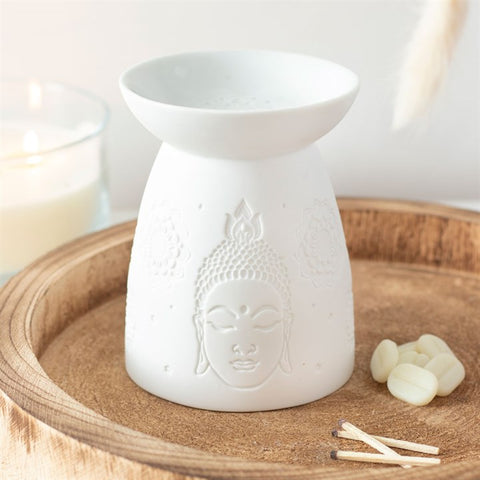 White ceramic Buddha face burner