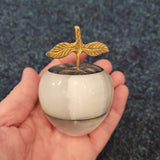 White Onyx Style Stone Apple with Brass Stem