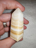 Banded orange calcite tower. Tower #63