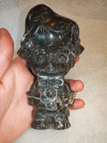 Quirky Black & White Stone Character Carving