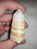 Banded orange calcite tower. Tower #63