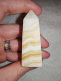 Banded orange calcite tower. Tower #63